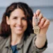 Happy Real Estate Agent with a property key