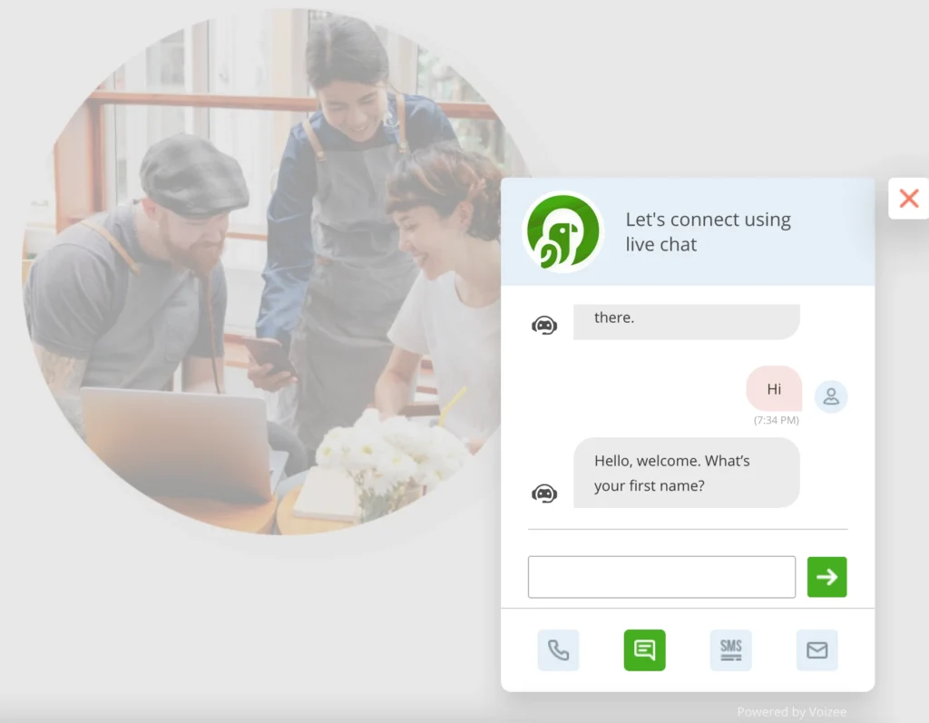 Voizee chat widget showing an AI bot greeting a visitor and asking for their first name.